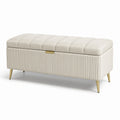 Panca in ecopelle beige con gambe in metallo dorato